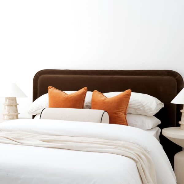 Brown bed head styled by Bowerbird Interiors