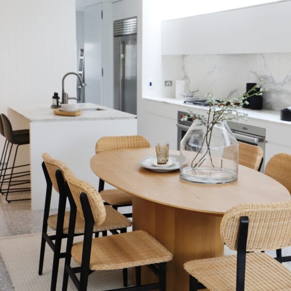 Timber oval dining table styled by BOWERBIRD Interiors